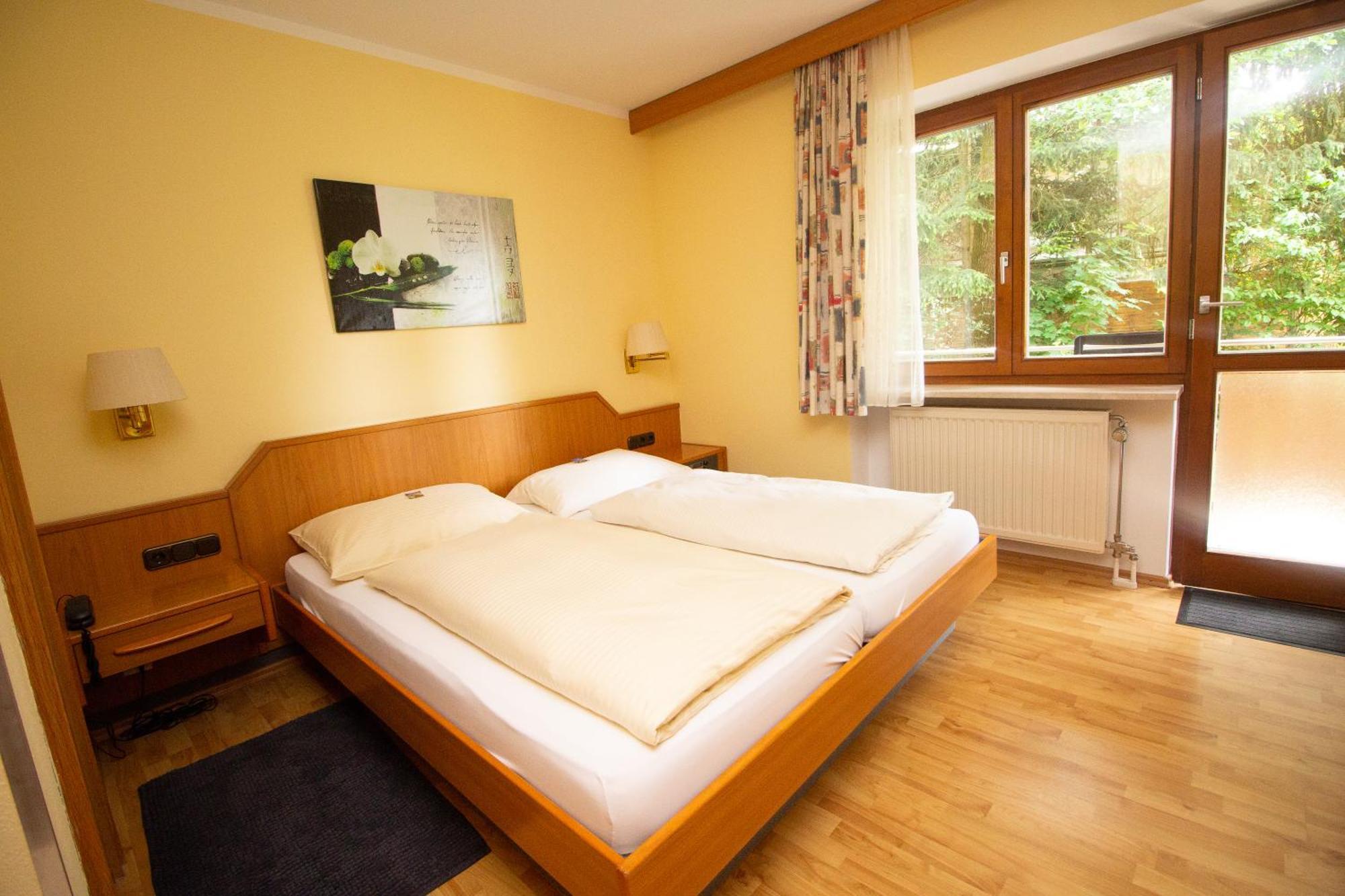 Hotel Am Wald Оттобрунн Экстерьер фото